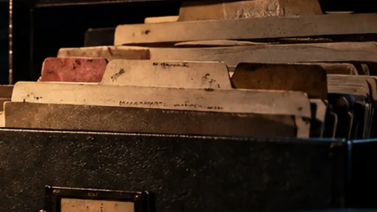 Worn file folders in an archive box